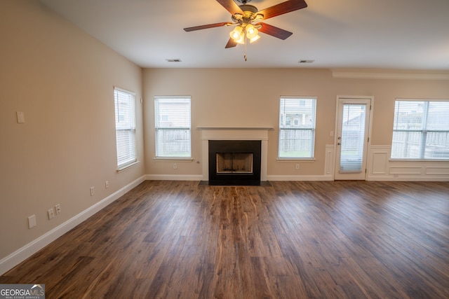 4135 Arch Pass, Cumming, GA 30040 - unfurnished living room with a fireplace with flush hearth, dark wood-style floors, a ceiling fan, and ornamental molding