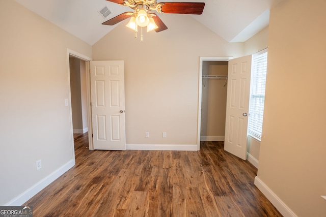 4135 Arch Pass, Cumming, GA 30040 - unfurnished bedroom with vaulted ceiling, wood finished floors, a closet, and ceiling fan