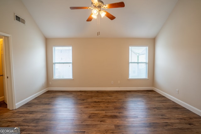 4135 Arch Pass, Cumming, GA 30040 - unfurnished room with lofted ceiling, healthy amount of natural light, a ceiling fan, and dark wood-type flooring