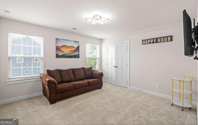 1049 Climbing Rose Way, Mcdonough, GA 30253 - living area with carpet flooring