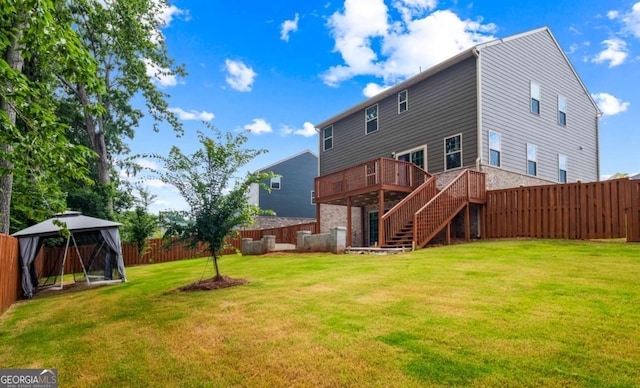 1049 Climbing Rose Way, Mcdonough, GA 30253 - rear view of property with a gazebo, stairway, and a deck