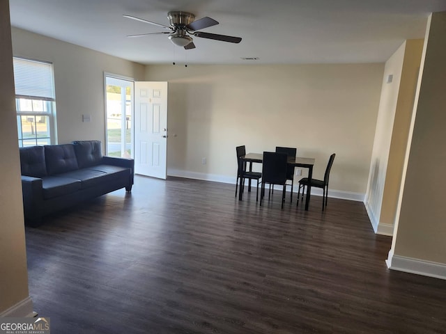 106 Ronald Pride Blvd, Fort Valley, GA 31030 - living room featuring ceiling fan and dark wood-type flooring
