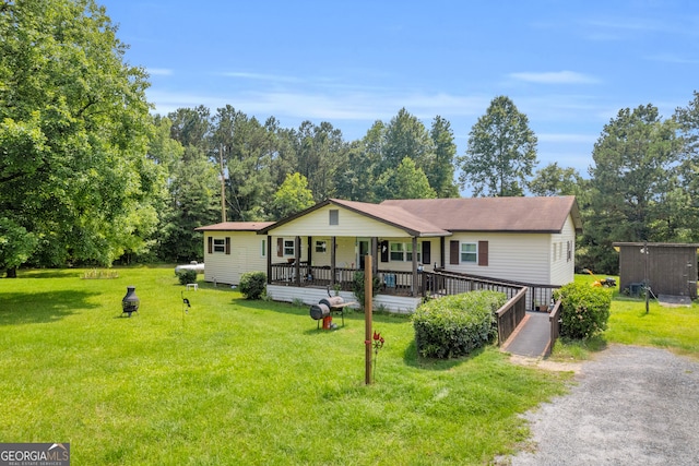 3131 Langley Rd, Loganville, GA 30052 - view of front of home featuring a porch and a front yard