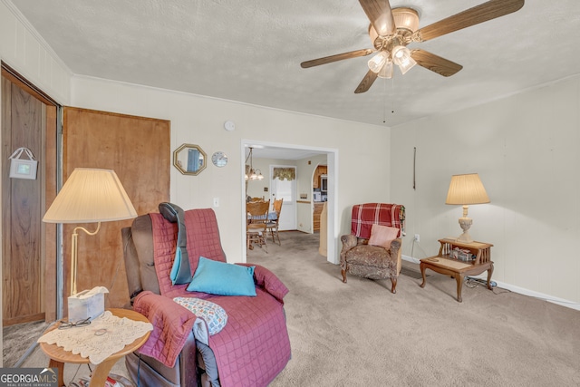 3131 Langley Rd, Loganville, GA 30052 - sitting room featuring carpet flooring, ceiling fan, baseboards, and a textured ceiling