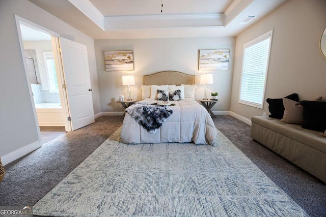 3557 Bryant Meadows Cir, Buford, GA 30519 - bedroom with carpet, a tray ceiling, baseboards, ensuite bath, and ornamental molding