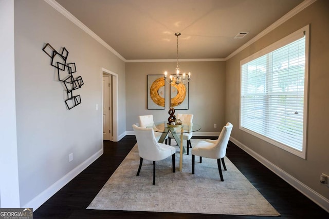 3557 Bryant Meadows Cir, Buford, GA 30519 - dining room with a chandelier, dark wood-style floors, baseboards, and ornamental molding