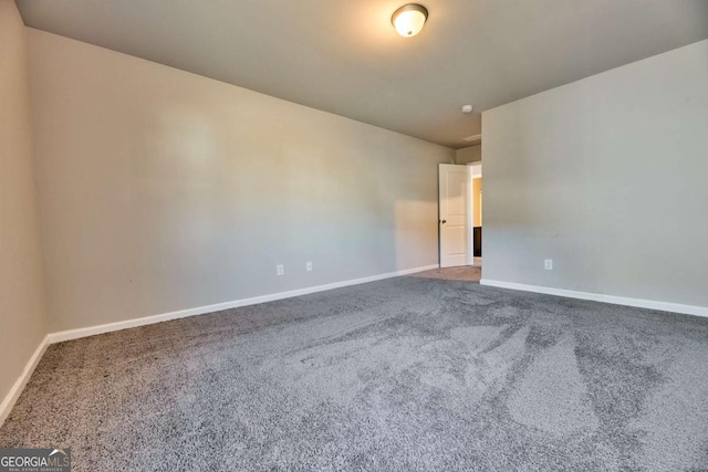 3557 Bryant Meadows Cir, Buford, GA 30519 - unfurnished room featuring baseboards and carpet