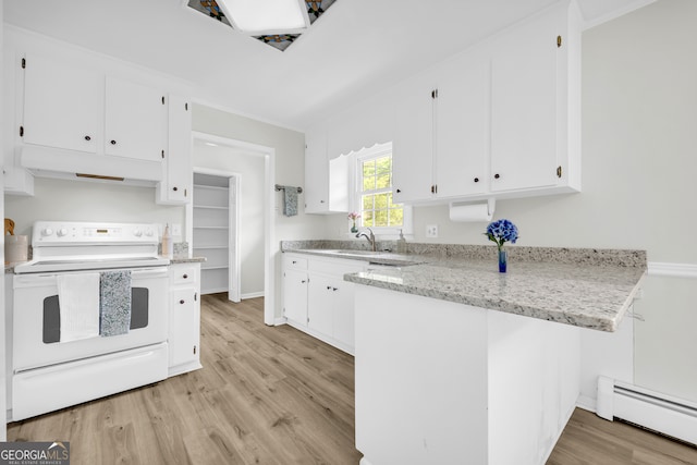 234 Edgewood Dr, Mount Airy, GA 30563 - kitchen with white electric range, under cabinet range hood, baseboard heating, white cabinets, and a sink