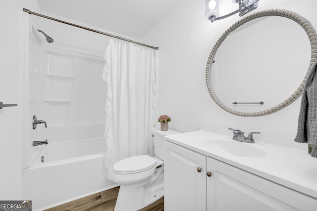 234 Edgewood Dr, Mount Airy, GA 30563 - full bath featuring wood finished floors, vanity, shower / bath combination with curtain, and toilet