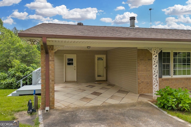 234 Edgewood Dr, Mount Airy, GA 30563 - property entrance with brick siding and roof with shingles