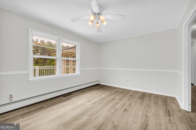 234 Edgewood Dr, Mount Airy, GA 30563 - empty room with baseboard heating, light wood-style floors, a ceiling fan, ornamental molding, and baseboards