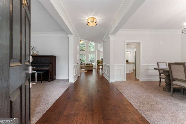 1055 Beacon Hill Xing, Alpharetta, GA 30005 - entrance foyer featuring decorative columns, crown molding, dark wood finished floors, and a decorative wall