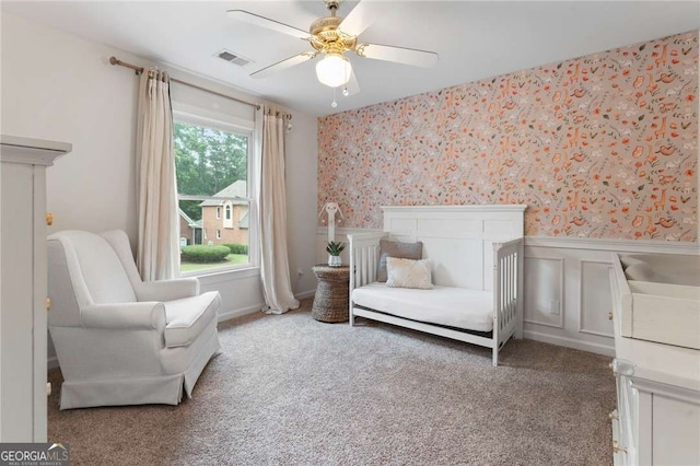 1055 Beacon Hill Xing, Alpharetta, GA 30005 - bedroom featuring wallpapered walls, a wainscoted wall, carpet floors, and ceiling fan