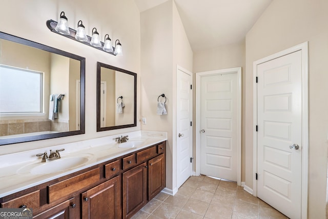 7946 White Oak Loop, Stonecrest, GA 30038 - bathroom featuring double vanity and tile patterned flooring