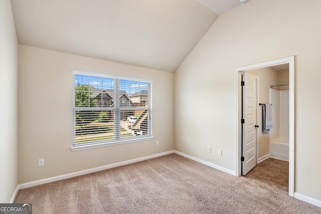 7946 White Oak Loop, Stonecrest, GA 30038 - unfurnished room featuring carpet and lofted ceiling