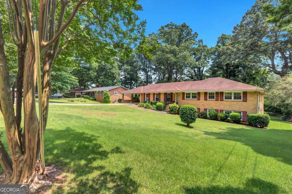 4177 Hapsburg Ct, Decatur, GA 30034 - ranch-style home featuring a front lawn