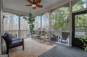 81 Cane Mill Ln, Dahlonega, GA 30533 - sunroom featuring a ceiling fan, a wooden deck, healthy amount of natural light, and floor to ceiling windows