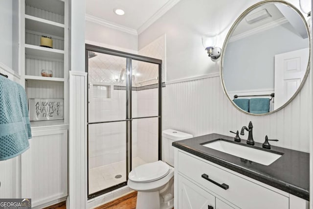 81 Cane Mill Ln, Dahlonega, GA 30533 - bathroom featuring vanity, a stall shower, ornamental molding, wood finished floors, and a wainscoted wall