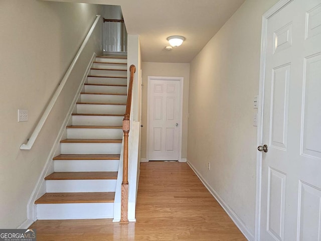 2104 Meadow Peak Rd, Duluth, GA 30097 - stairway featuring wood finished floors and baseboards