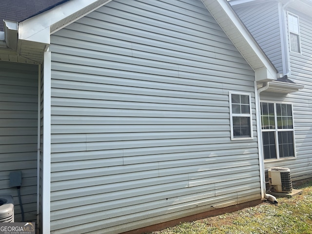 740 Pebble Blvd, Covington, GA 30016 - view of side of home featuring central air condition unit