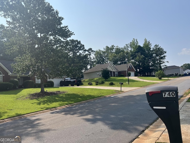 740 Pebble Blvd, Covington, GA 30016 - view of front of property with a front lawn