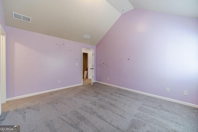 1022 Nestling Dr, Lawrenceville, GA 30045 - carpeted empty room with vaulted ceiling and baseboards