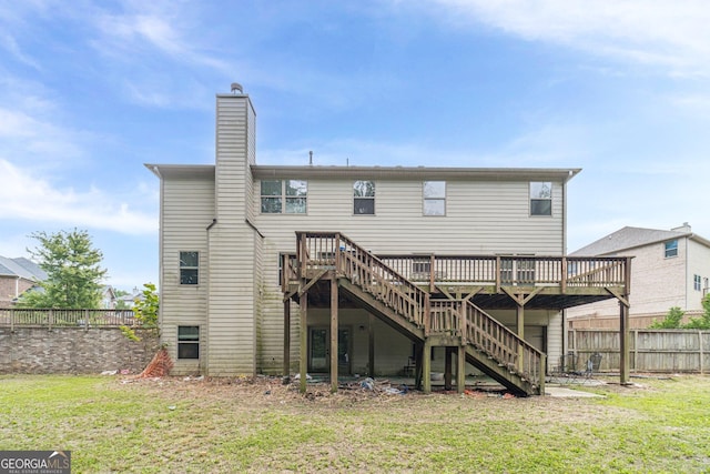 1022 Nestling Dr, Lawrenceville, GA 30045 - rear view of house with stairs, a deck, and a chimney