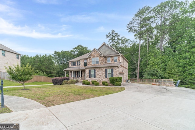 1022 Nestling Dr, Lawrenceville, GA 30045 - craftsman house with driveway, brick siding, and an attached garage