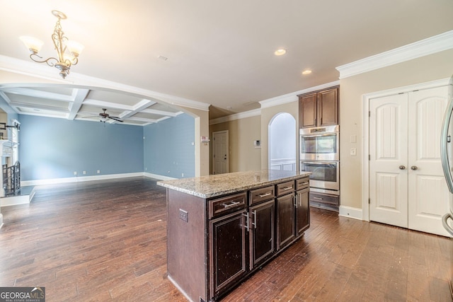 1022 Nestling Dr, Lawrenceville, GA 30045 - kitchen featuring a ceiling fan, baseboards, double oven, a chandelier, and recessed lighting