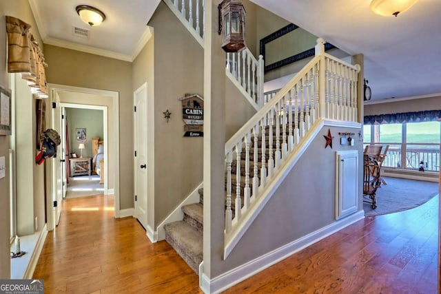296 Tallulah Vw, Tallulah Falls, GA 30573 - stairway featuring hardwood / wood-style floors and ornamental molding