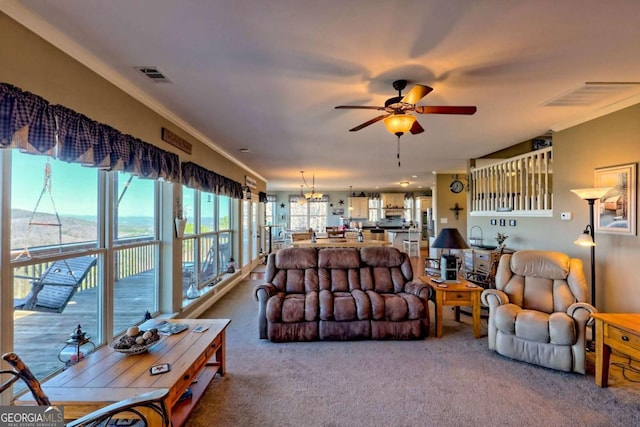 296 Tallulah Vw, Tallulah Falls, GA 30573 - carpeted living room with a ceiling fan and ornamental molding