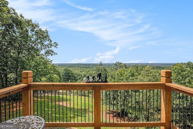 675 Wauka Ridge Rd, Clermont, GA 30527 - wooden deck featuring a lawn and a wooded view
