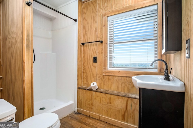675 Wauka Ridge Rd, Clermont, GA 30527 - bathroom with toilet, a shower, wood finished floors, and vanity