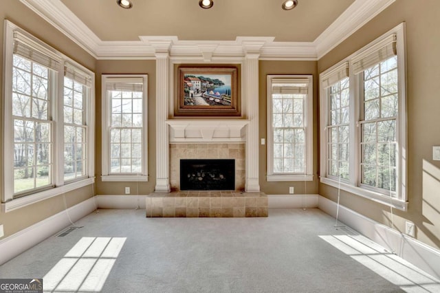 2279 Weeping Oak Dr, Braselton, GA 30517 - unfurnished living room featuring plenty of natural light, ornamental molding, recessed lighting, and carpet flooring