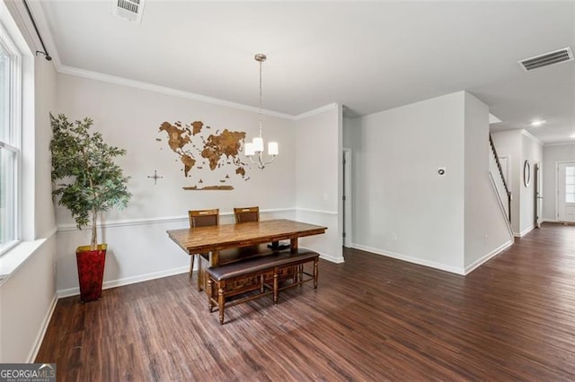 520 Edgemore Rd, Canton, GA 30114 - dining area with wood finished floors, a chandelier, baseboards, crown molding, and recessed lighting