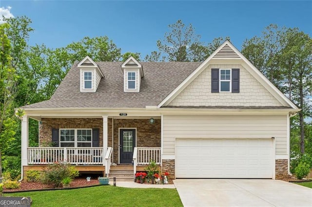 520 Edgemore Rd, Canton, GA 30114 - view of front of home with stone siding, driveway, a porch, and a front yard