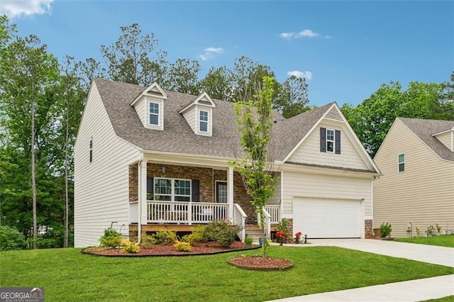 520 Edgemore Rd, Canton, GA 30114 - view of front facade with stone siding, a porch, driveway, an attached garage, and a front yard