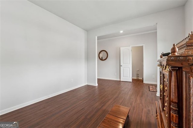520 Edgemore Rd, Canton, GA 30114 - unfurnished living room featuring dark wood finished floors and baseboards