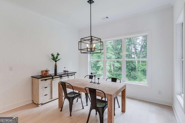 5306 Weeping Creek Trl, Flowery Branch, GA 30542 - dining room with a chandelier, healthy amount of natural light, and light wood-style floors