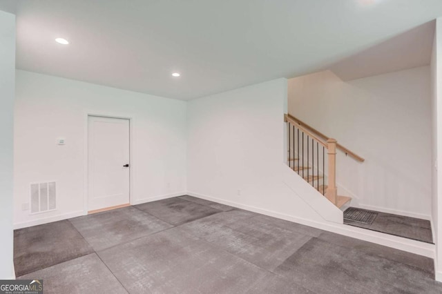 5306 Weeping Creek Trl, Flowery Branch, GA 30542 - unfurnished room with stairway, baseboards, recessed lighting, and concrete flooring