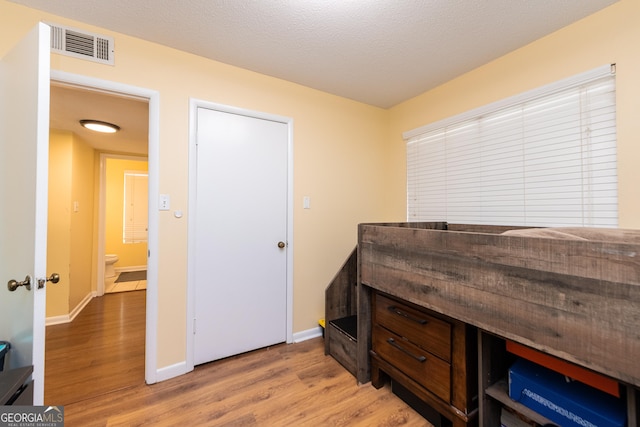 141 Stoneridge Dr, Warner Robins, GA 31088 - office area featuring light wood-style flooring and baseboards