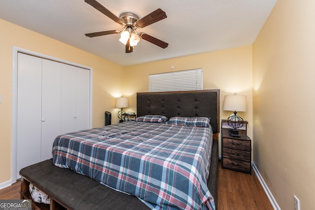 141 Stoneridge Dr, Warner Robins, GA 31088 - bedroom with wood finished floors, baseboards, a closet, and ceiling fan