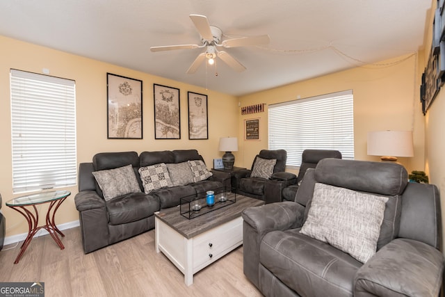 141 Stoneridge Dr, Warner Robins, GA 31088 - living room featuring light wood-style flooring, ceiling fan, and baseboards