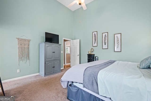 167 Maggies Pt, Dallas, GA 30132 - bedroom with high vaulted ceiling, light colored carpet, and ceiling fan
