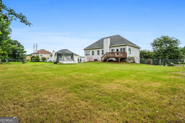 167 Maggies Pt, Dallas, GA 30132 - back of property featuring a wooden deck, a fenced backyard, and stairs