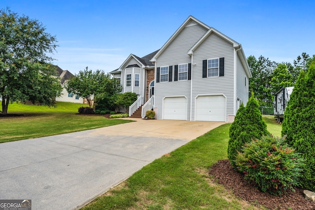 167 Maggies Pt, Dallas, GA 30132 - view of front of property with an attached garage, concrete driveway, and a front yard