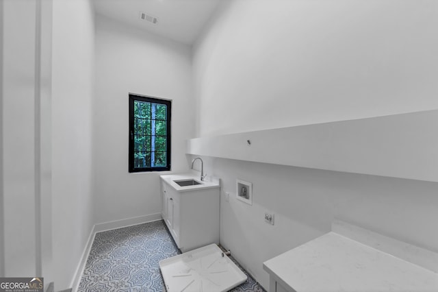 4235 Drew Campground Rd, Alpharetta, GA 30004 - laundry area with hookup for an electric dryer, hookup for a washing machine, and cabinet space