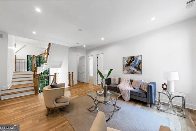 4235 Drew Campground Rd, Alpharetta, GA 30004 - living area featuring light wood-style floors, stairway, and recessed lighting