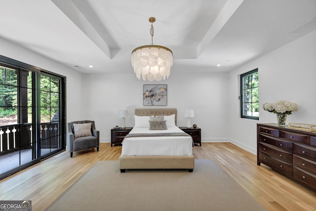 4235 Drew Campground Rd, Alpharetta, GA 30004 - bedroom with multiple windows, wood finished floors, recessed lighting, and a chandelier