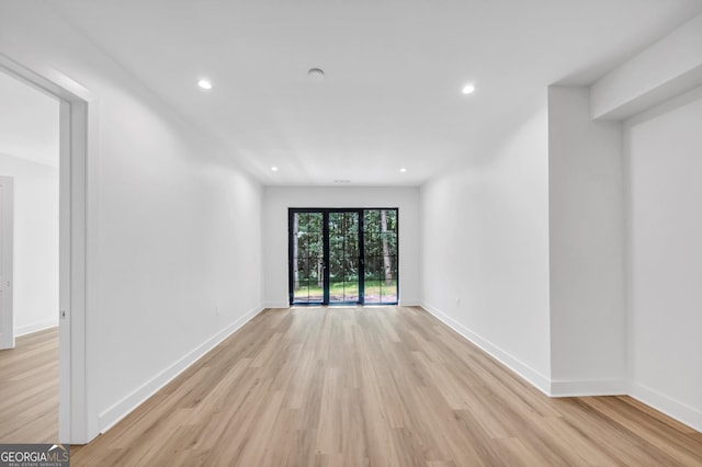 4235 Drew Campground Rd, Alpharetta, GA 30004 - unfurnished room with light wood-style floors and recessed lighting